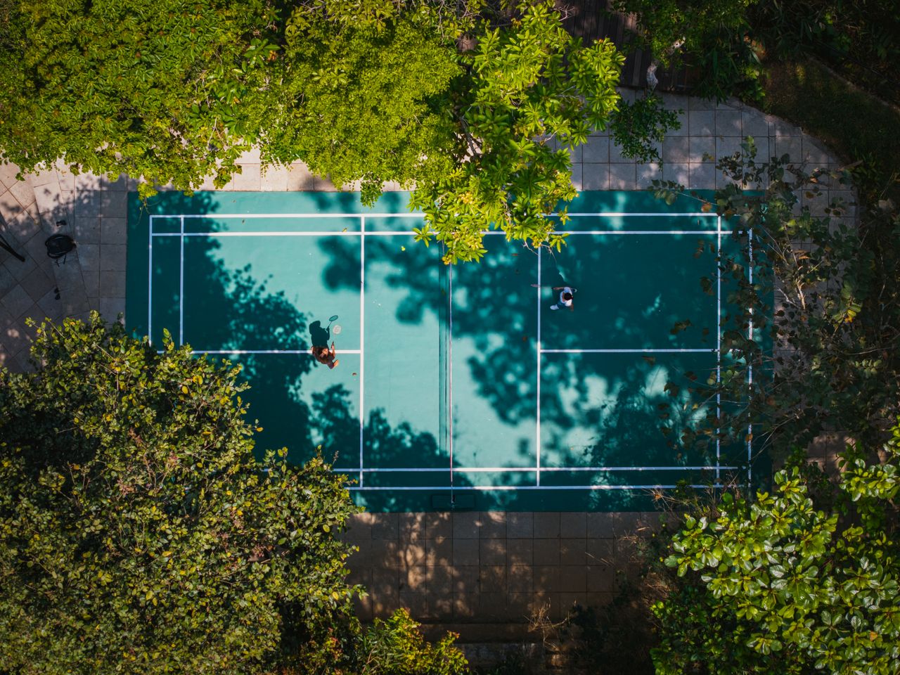 Tennis players on court